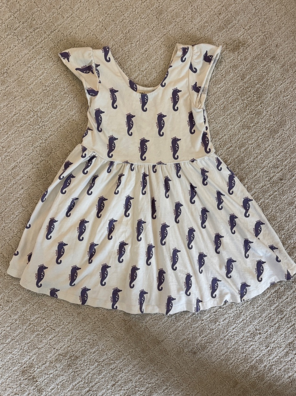 Girls White Sleeveless Dress with Purple Seahorse Print